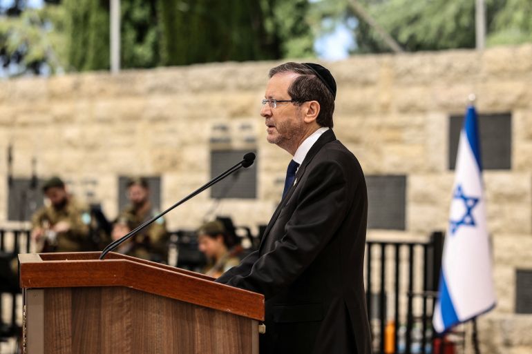 Israel’s President Isaac Herzog addresses a ceremony commemorating Israel’s Remembrance Day for fallen soldiers, or Yom HaZikaron, at the Military Cemetery on Mount Herzl in Jerusalem April 21, 2026. ILIA YEFIMOVICH/Pool via REUTERS