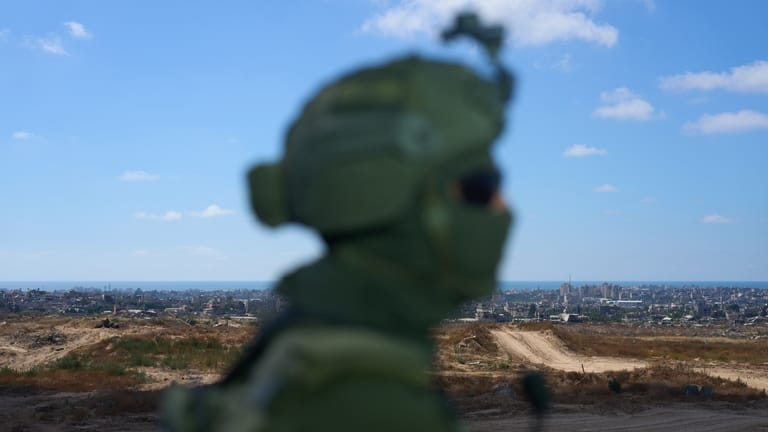 An Israeli soldier occupies a military position overlooking the so-called...