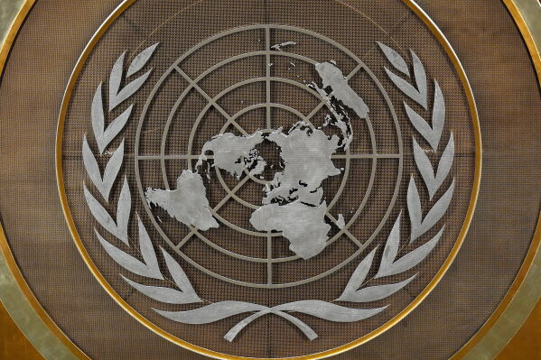 The United Nations logo is seen inside the 79th session of the United Nations General Assembly, Tuesday, Sept. 24, 2024. (AP Photo/Pamela Smith, File)