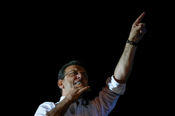 Istanbul Mayor and Republican People's Party, or CHP, candidate Ekrem Imamoglu addresses supporters outside the City Hall in Istanbul, Turkey, early Monday, April 1, 2024. (AP Photo/Khalil Hamra, File)