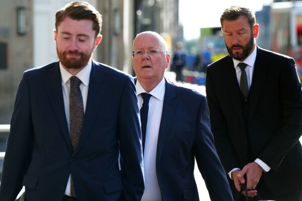 Former SNP chief executive Peter Murrell, center arrives at Edinburgh High Court, in Edinburgh, Scotland, Monday May 25, 2026. (Jane Barlow/PA via AP)