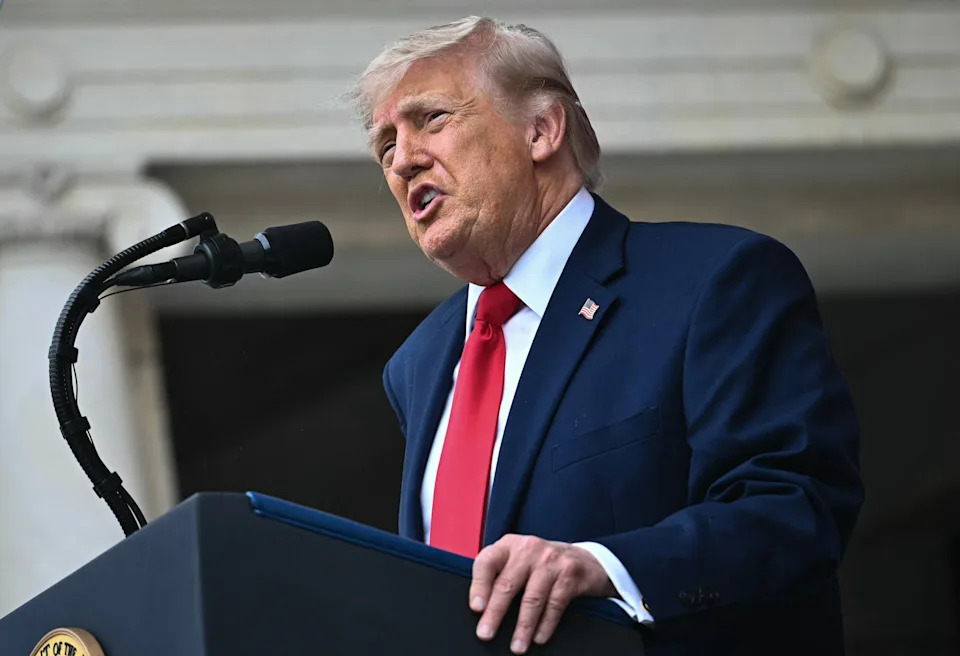 Kent Nishimura/AFP via Getty Images - PHOTO: President Donald Trump delivers remarks during a Memorial Day ceremony at Arlington National Cemetery, May 25, 2026 in Arlington, Virginia.