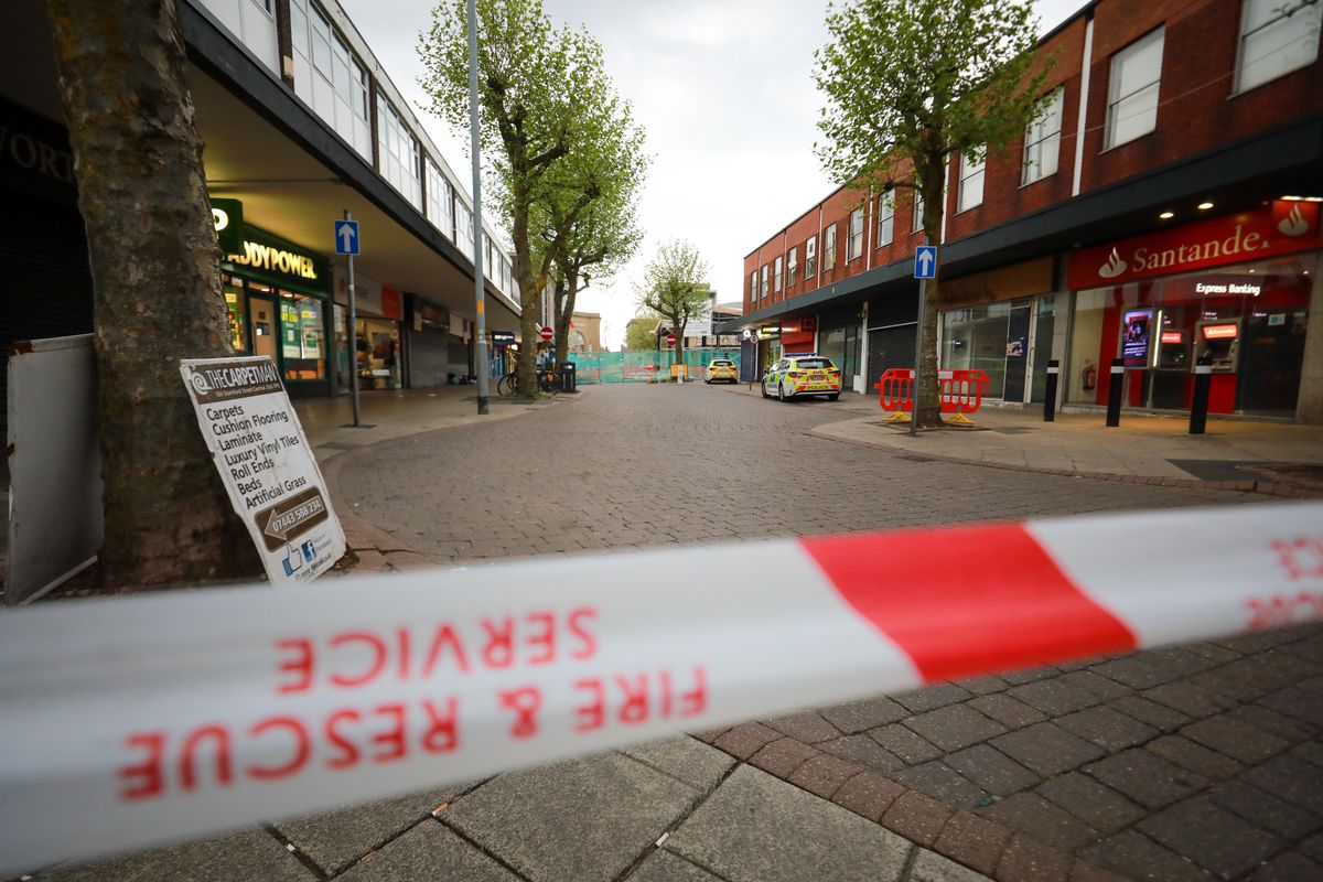 Police scene in Ashton town centre after suspected acid attack. Credit: ASP