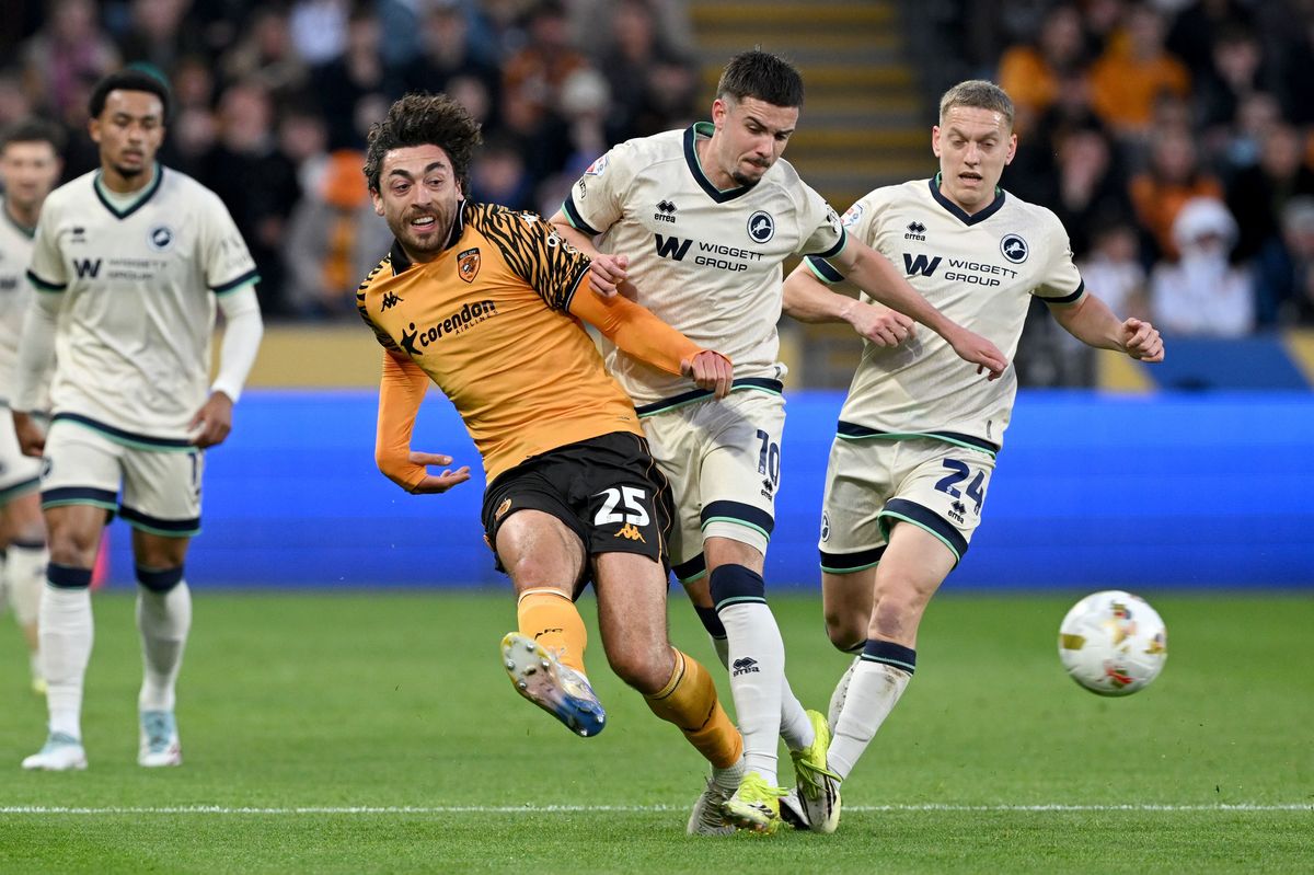 Matt Crooks and Camiel Neghli battle in the first leg of the semi-final