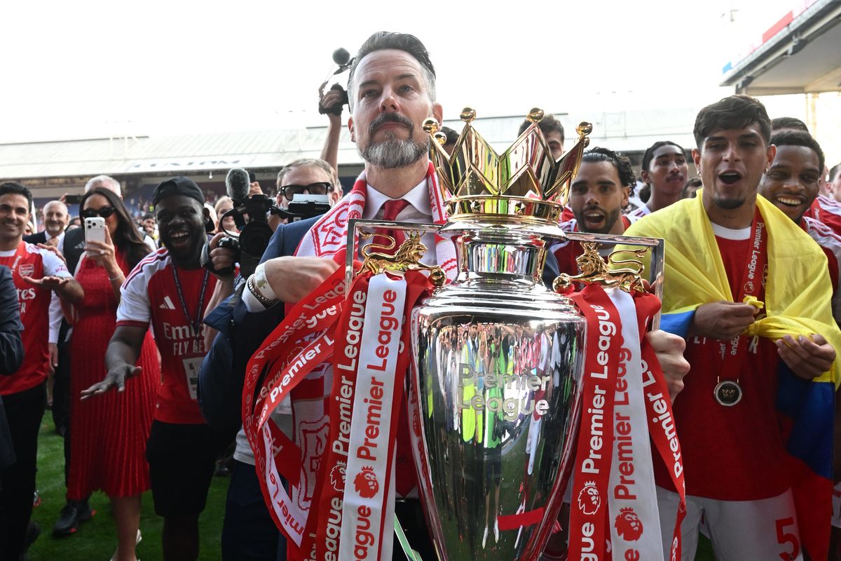 Arsenal co-chair Josh Kroenke celebrates after Gunners win the Premier League