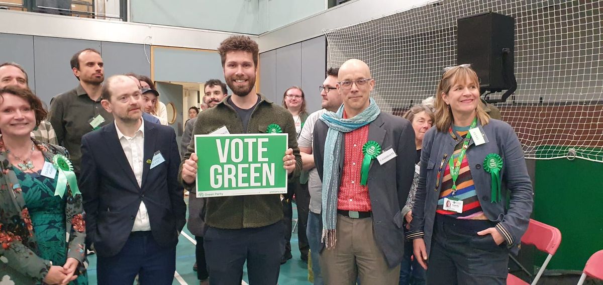 Jack Reed celebrates his election with Green Party colleagues