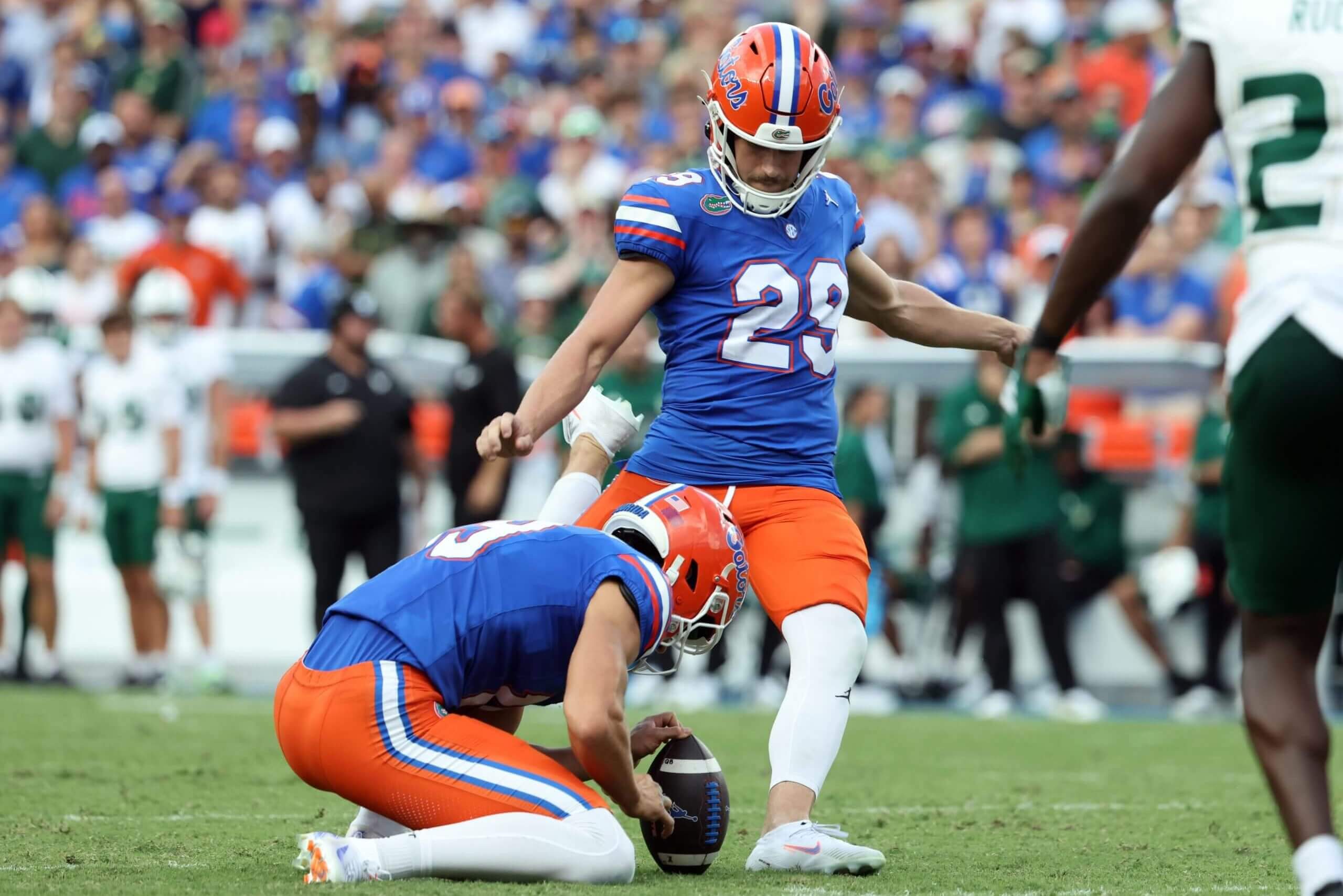 Florida Gators place kicker Trey Smack (29) kicks a field goal against the South Florida Bulls during the second quarter at Ben Hill Griffin Stadium.