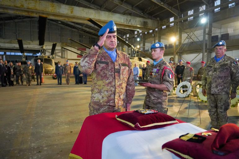 UNIFIL Head of Mission and Force Commander Major General Diodato Abagnara pays tribute to Sergeant-Chef Florian Montorio, who was killed while clearing a road in southern Lebanon in an attack that UNIFIL peacekeepers and French officials said was likely carried out by Hezbollah, at Beirut-Rafic Hariri International Airport in Beirut, Lebanon, April 19, 2026. Haidar Fahs/UNIFIL/Handout via REUTERS THIS IMAGE HAS BEEN SUPPLIED BY A THIRD PARTY