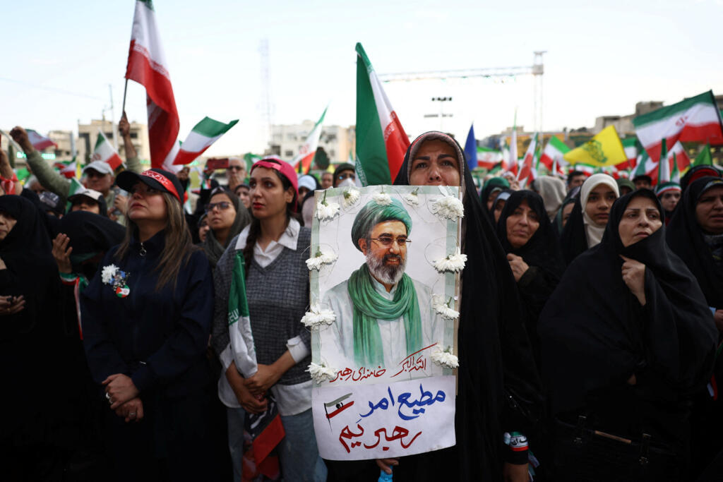 A woman holds a poster depicting Iran's new Supreme Leader, Mojtaba Khamenei, during a rally in Tehran, Iran, on 29 April, 2026.