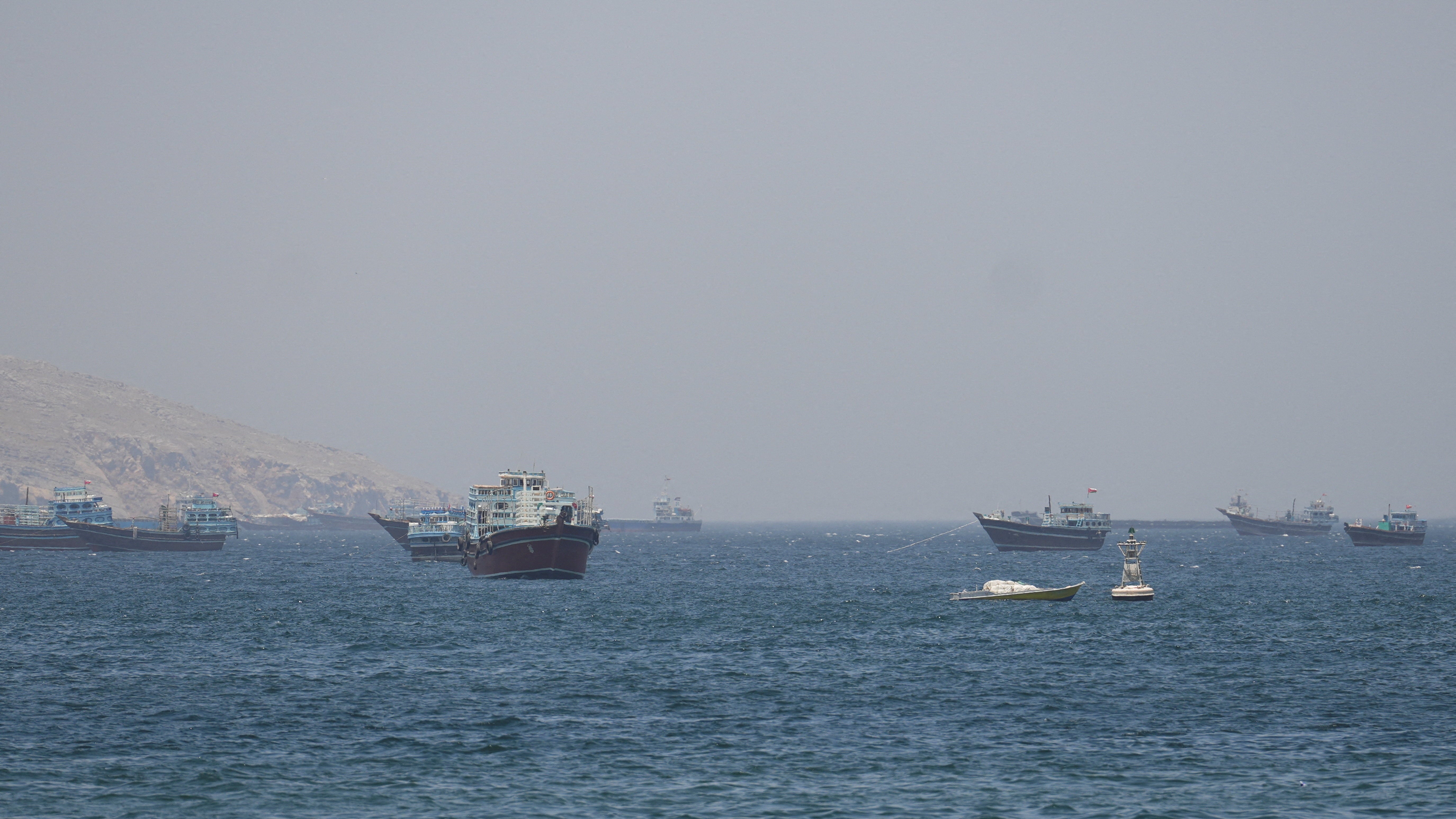 Ships and boats remain stalled in the Strait of Hormuz, near Musandam, Oman, on Monday 4 May