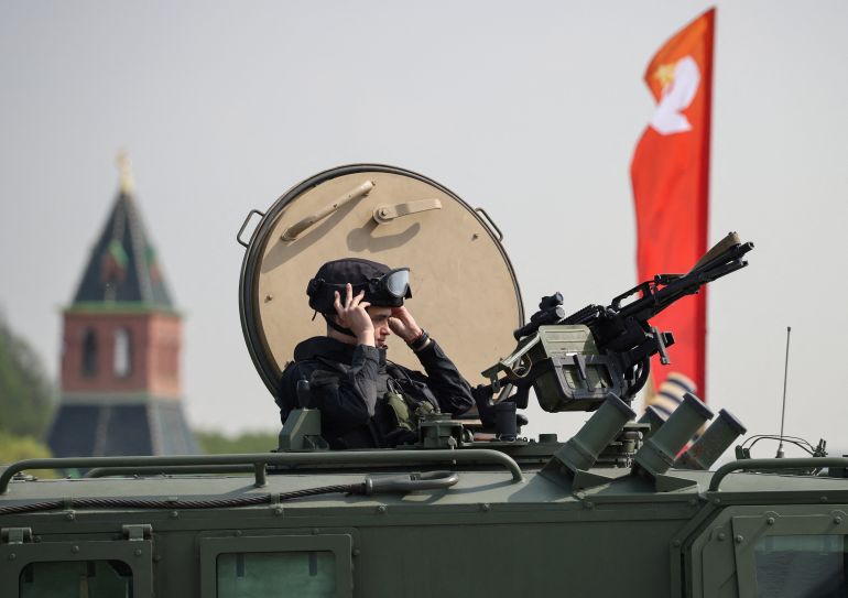 A Russian security officer remains atop an all-terrain infantry mobility vehicle amid increased security measures taken ahead of Victory Day, marking the anniversary of victory over Nazi Germany in World War Two, near the Kremlin in central Moscow, Russia, May 7, 2026. REUTERS/Stringer