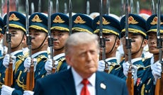 U.S. President Donald Trump reviewing Chinese troops in Beijing on Thursday.