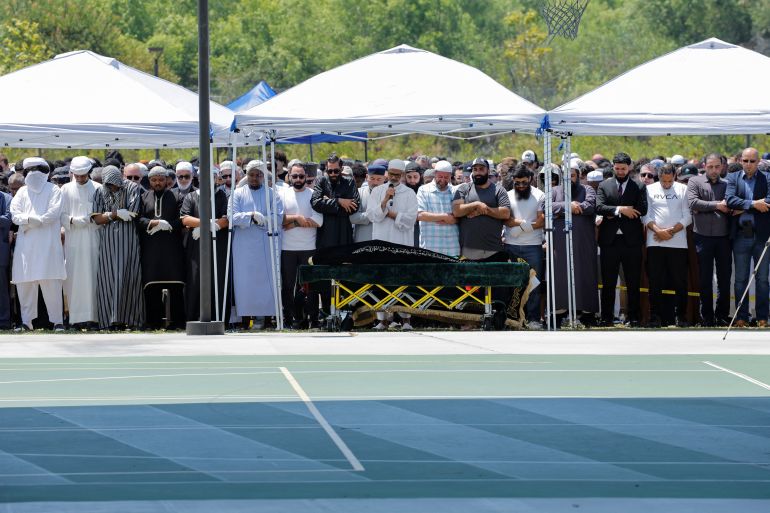 Imam Taha Hassane attends a prayer service for the victims of a shooting at the Islamic Center, in San Diego,