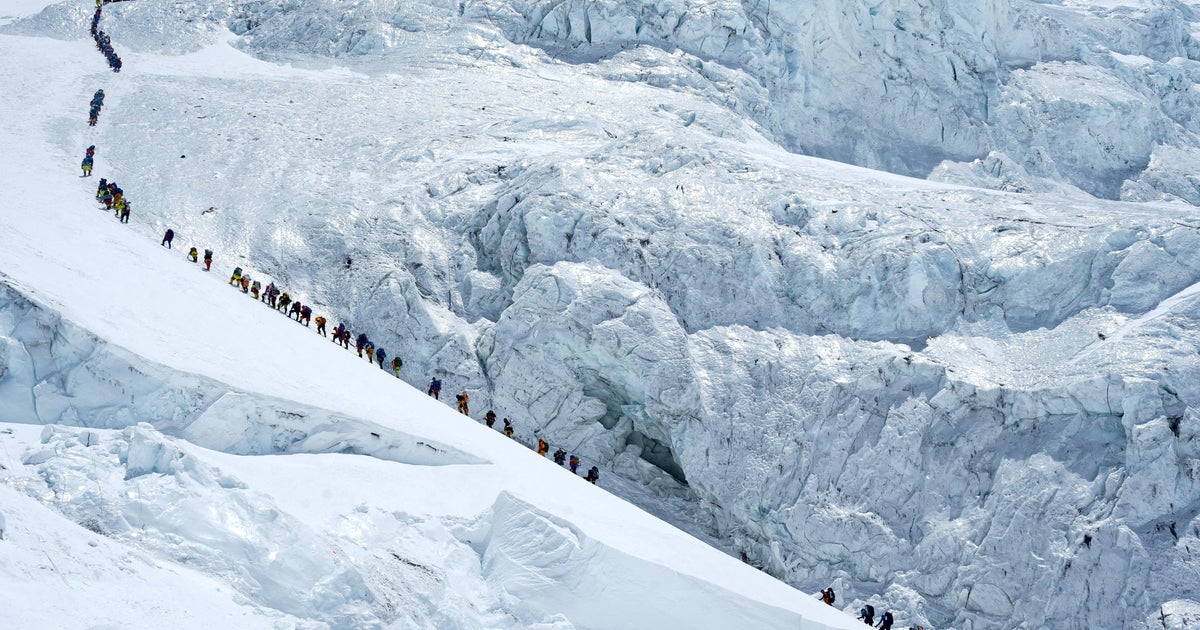 2 Mount Everest climbers fall to their deaths as record-holder warns of overcrowding
