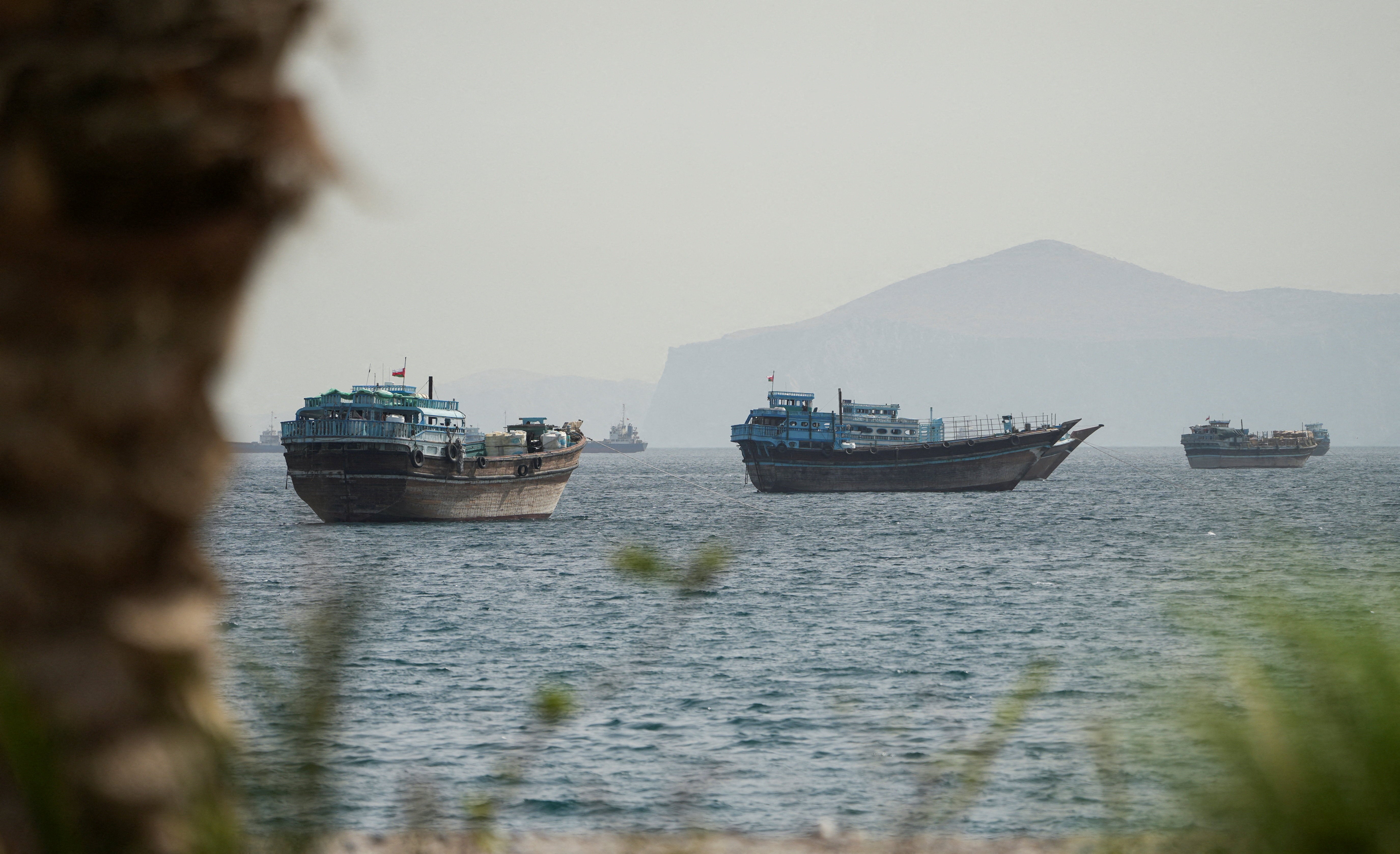 Vessels sail through the Strait of Hormuz, Musandam, Oman