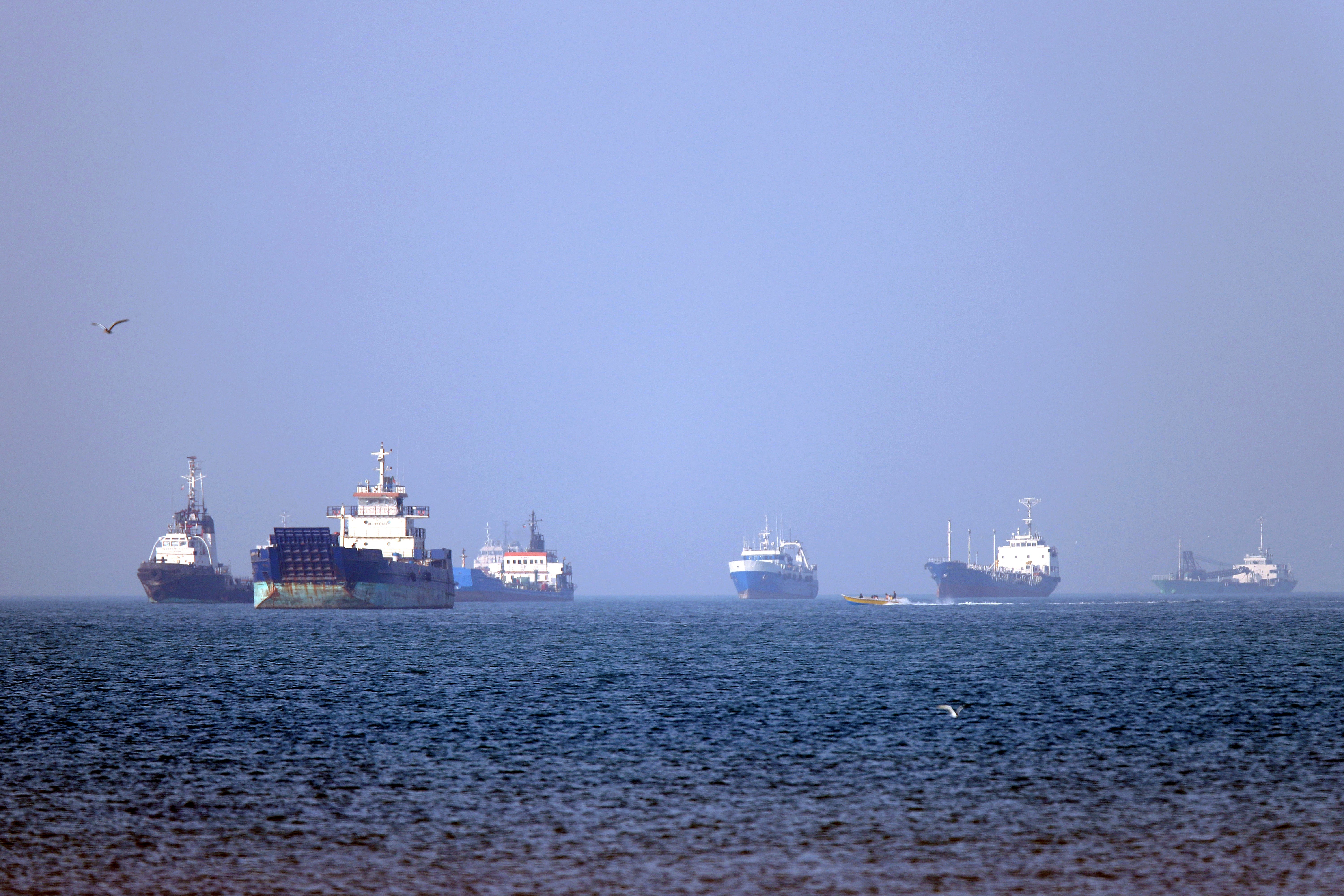 Vessels anchored in the Strait of Hormuz off Bandar Abbas in southern Iran on Monday
