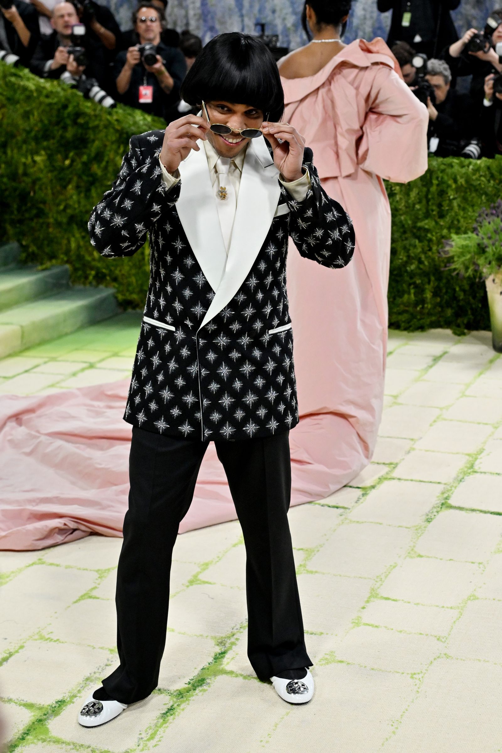 Image may contain Anderson .Paak Clothing Formal Wear Suit Coat Adult Person Face and Head