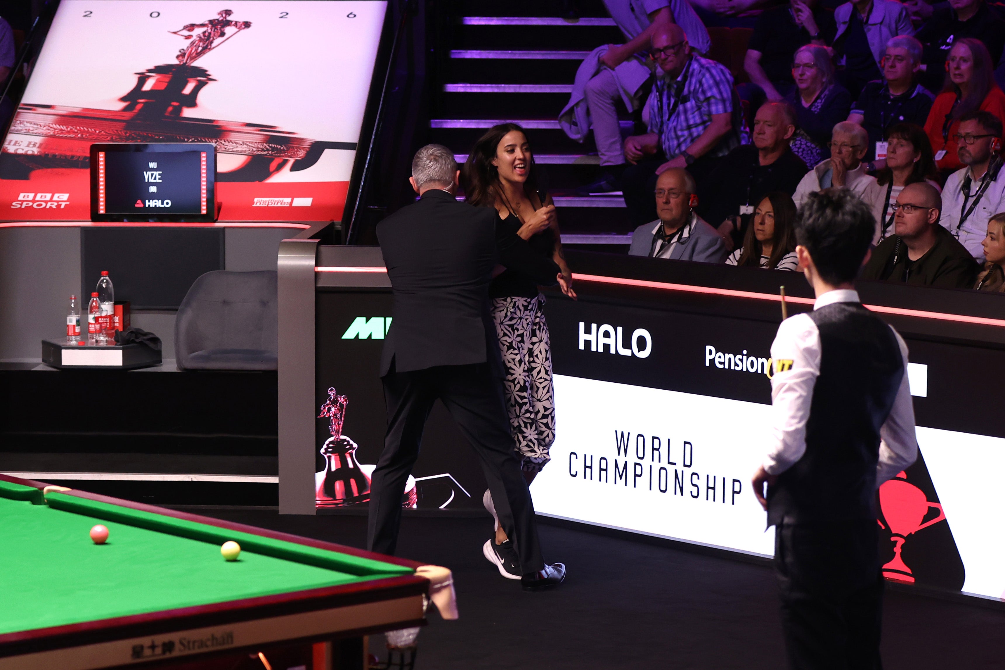 The protester was expertly subdued by referee Rob Spencer