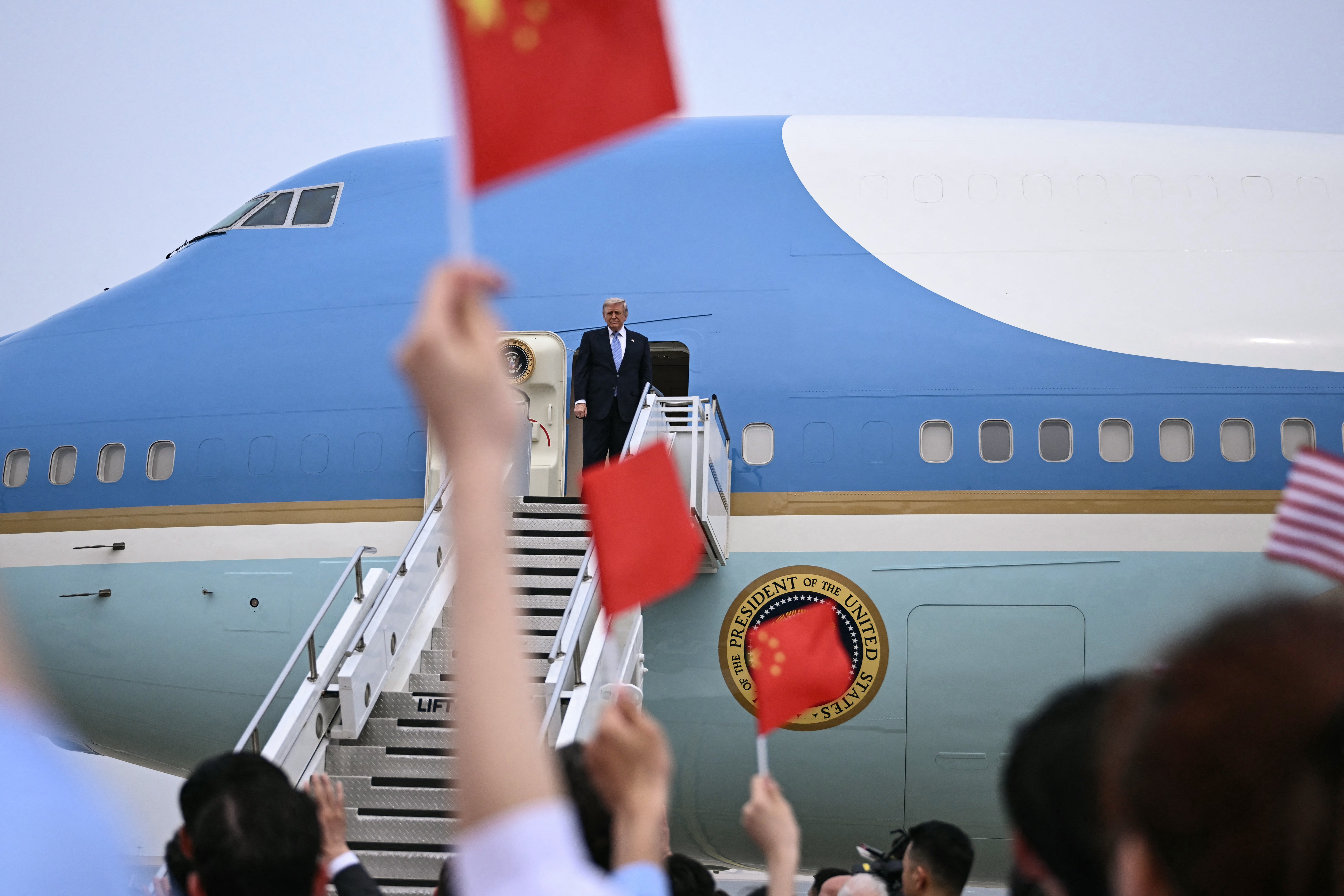 Donald Trump boards Air Force One at Beijing Capital Airport