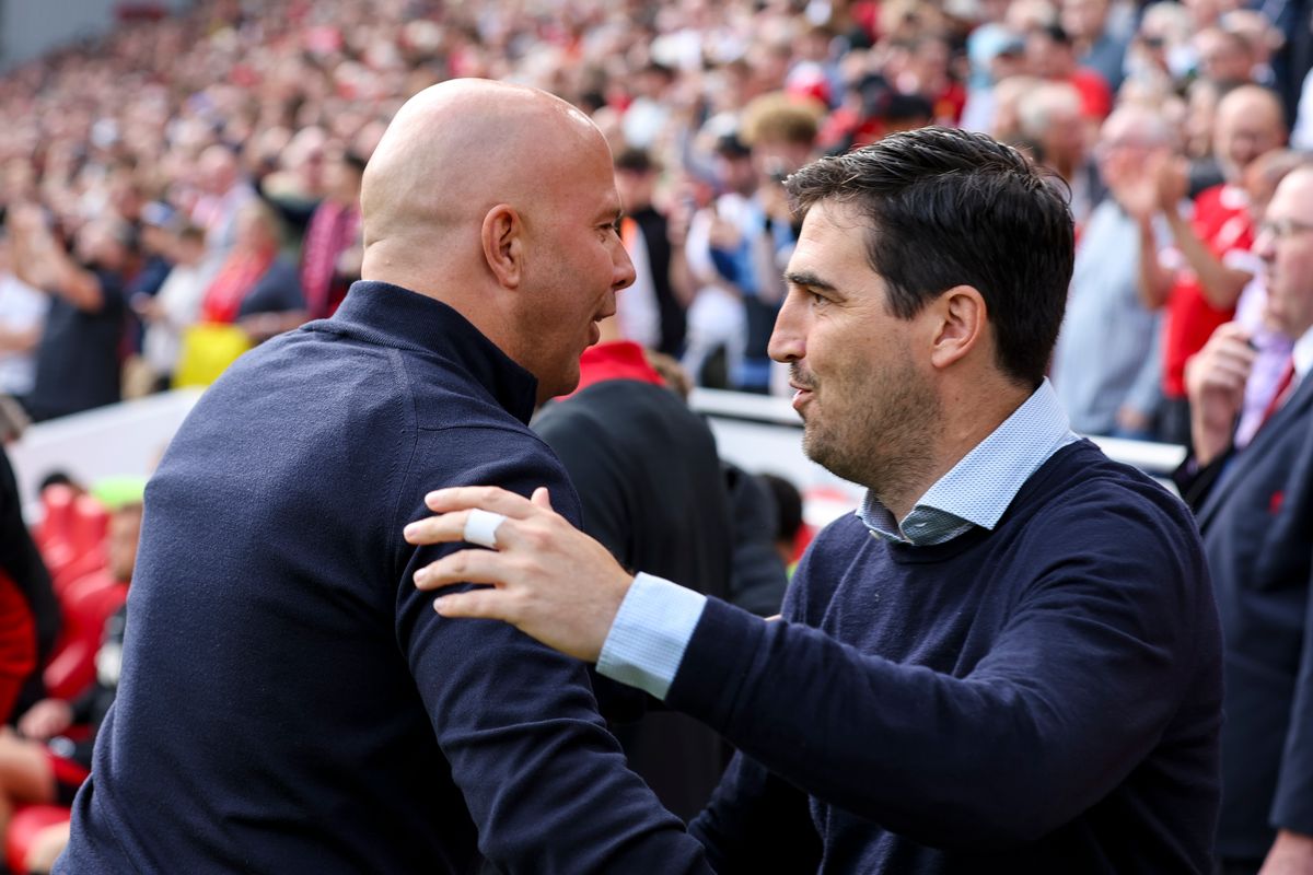 Liverpool head coach Arne Slot with Andoni Iraola of Bournemouth