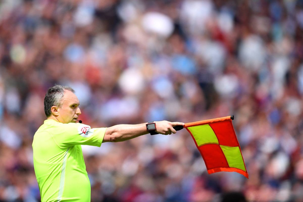 Darren Cann gives an offside