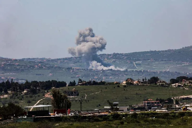 FILE PHOTO - Smoke rises following an Israeli airstrike on southern Lebanon, as seen from northern Israel. (zu dpa: «Israel, Hezbollah exchange fire with strikes reported in south Lebanon») Gil Cohen-Magen/dpa