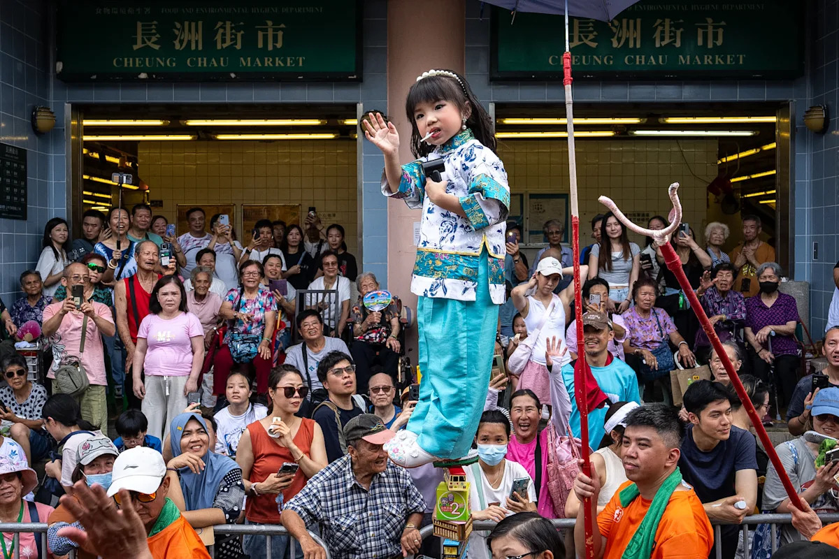 Revelers pack a Hong Kong island for a bun festival, a century-old tradition