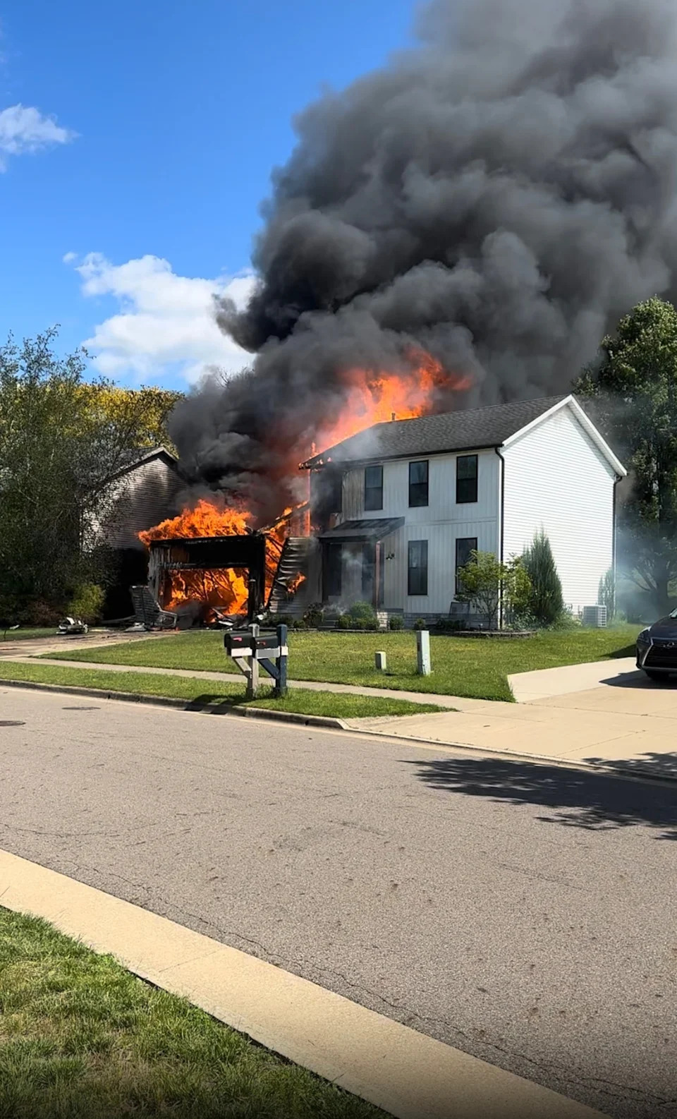 Jacob Young - PHOTO: Two people aboard a small plane are dead after the aircraft crashed into a house in Akron, Ohio, causing a fire, authorities said.