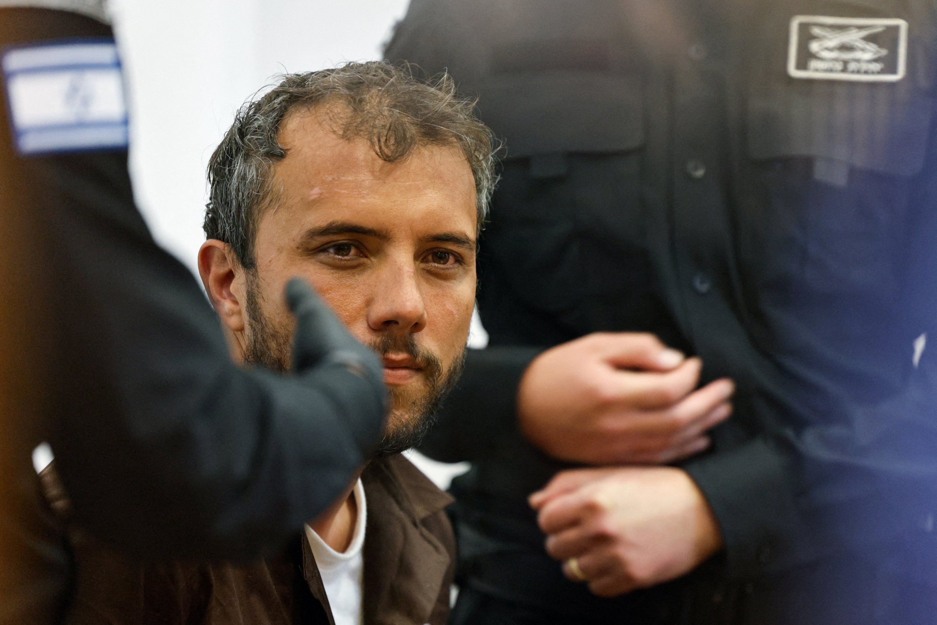 Brazilian Activist Thiago Avila, who was detained aboard the Gaza-bound Global Sumud Flotilla, which was intercepted by Israeli forces in international waters, appears at a court in Beersheba, southern Israel, May 6, 2026. (Reuters Photo)