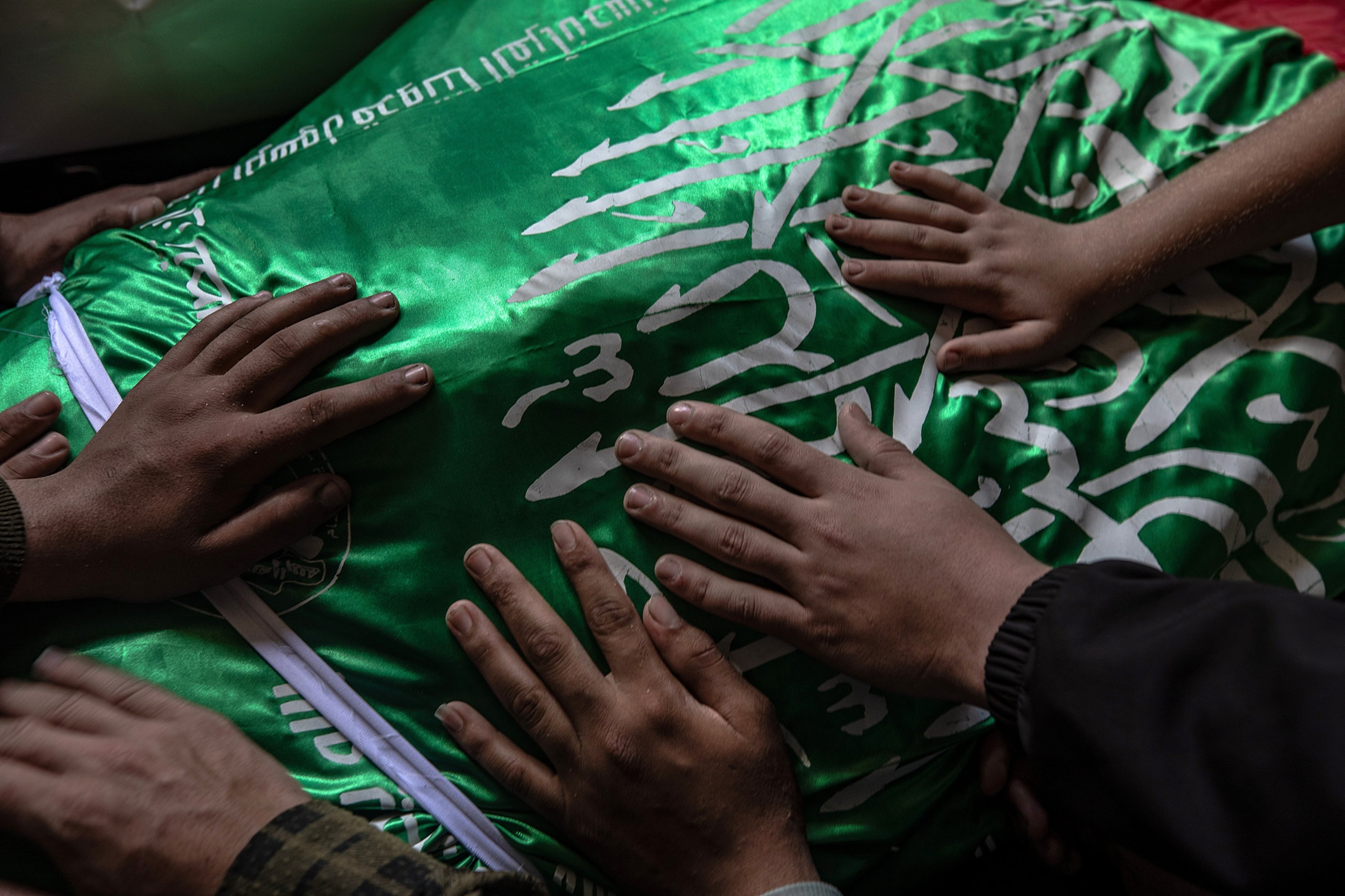 Palestinian relatives mourn over the body of Izz al-Din al-Haddad, the commander of the al-Qassam Brigades, during his funeral procession in Gaza City, Palestine, May 16, 2026. (EPA Photo)