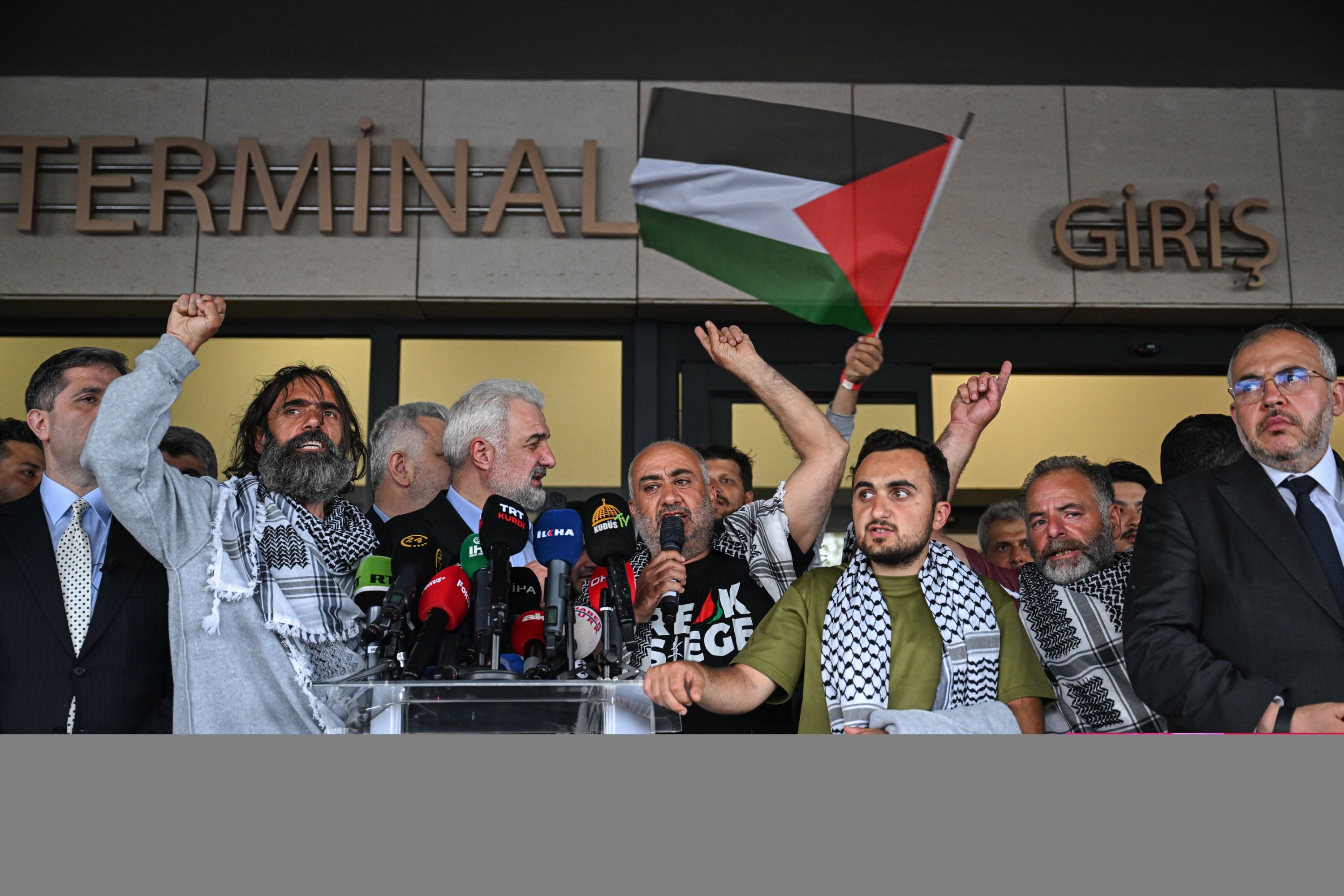 Activists from the Gaza-bound Global Sumud Flotilla, detained by Israeli forces after their vessels were intercepted in international waters in the Mediterranean, speak upon arrival at Istanbul Airport, Istanbul, Türkiye, May 21, 2026. (AA Photo)
