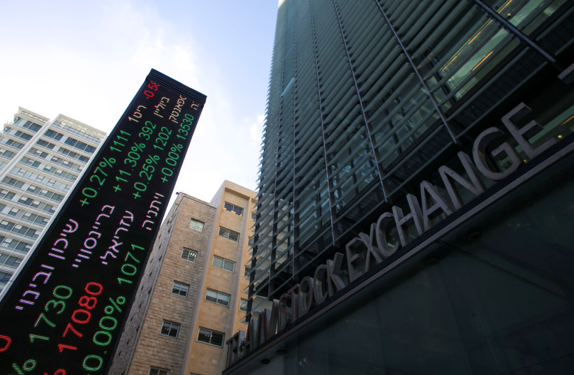 An electronic board displaying market data is seen at the entrance of the Tel Aviv Stock Exchange, in Tel Aviv, Israel
