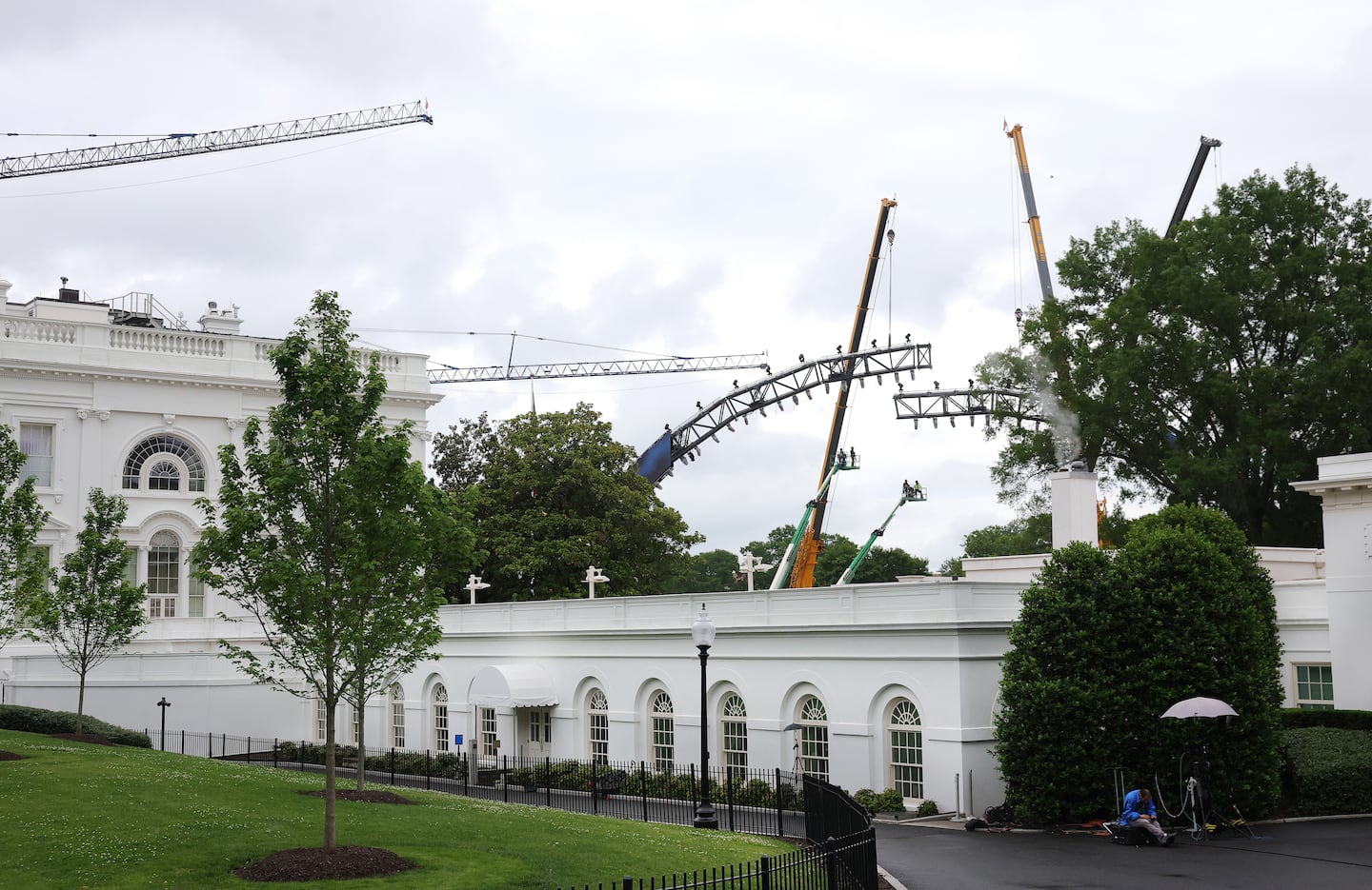 Construction crews on the site of an upcoming UFC match on the South Lawn of the White House, seen on Monday. 