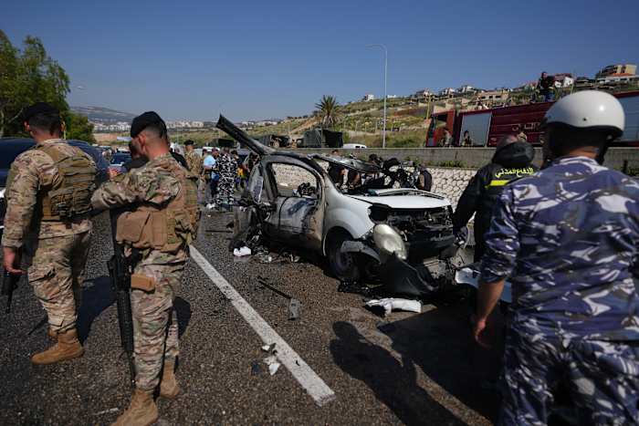 Israeli drone strikes near Beirut kill 4 and southern airstrikes kill at least 13