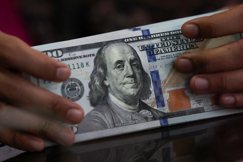 Dollar whipsawed by conflicting Iran deal signals