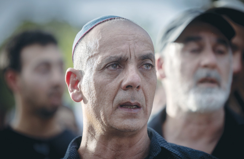 SHANI LOUK’S father, Nissim, looks on at Shani’s funeral this week, after her body was retrieved by the IDF from the Gaza Strip. Shani was murdered on October 7 as she tried to escape the Hamas massacre at the Supernova music festival.