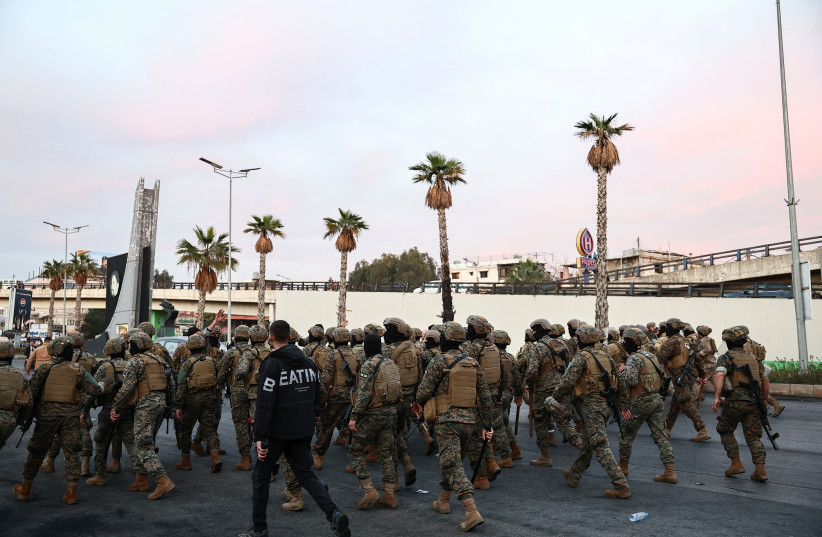 Members of the Lebanese army walk near Beirut international airport, Lebanon, February 15, 2025