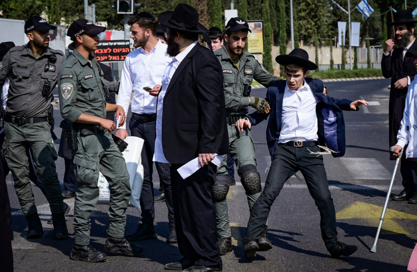 Ultra-Orthodox Jews clash with police outside the IDF Recruitment Center at Tel Hashomer, central Israel, April 28, 2025