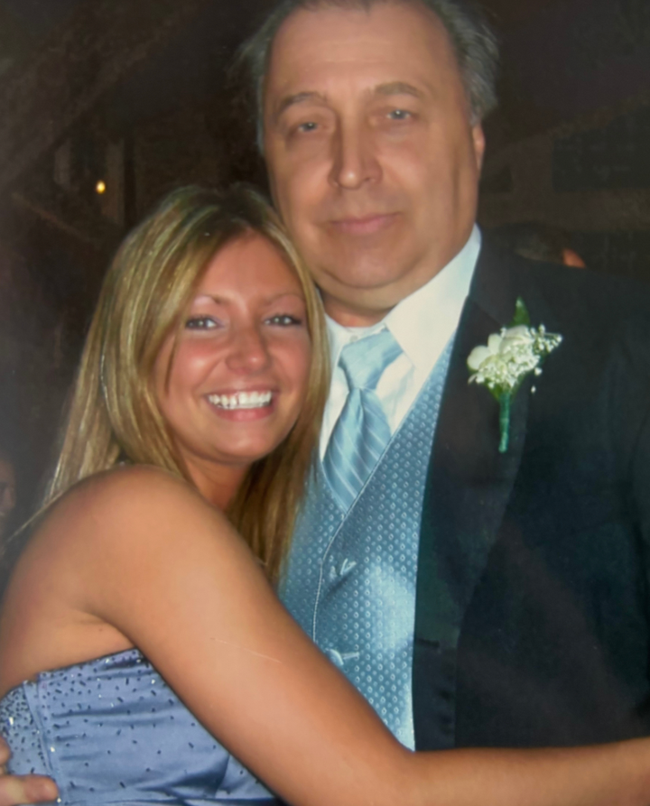 The author and her Dad (the man who raised her) at her sister's wedding in 2008