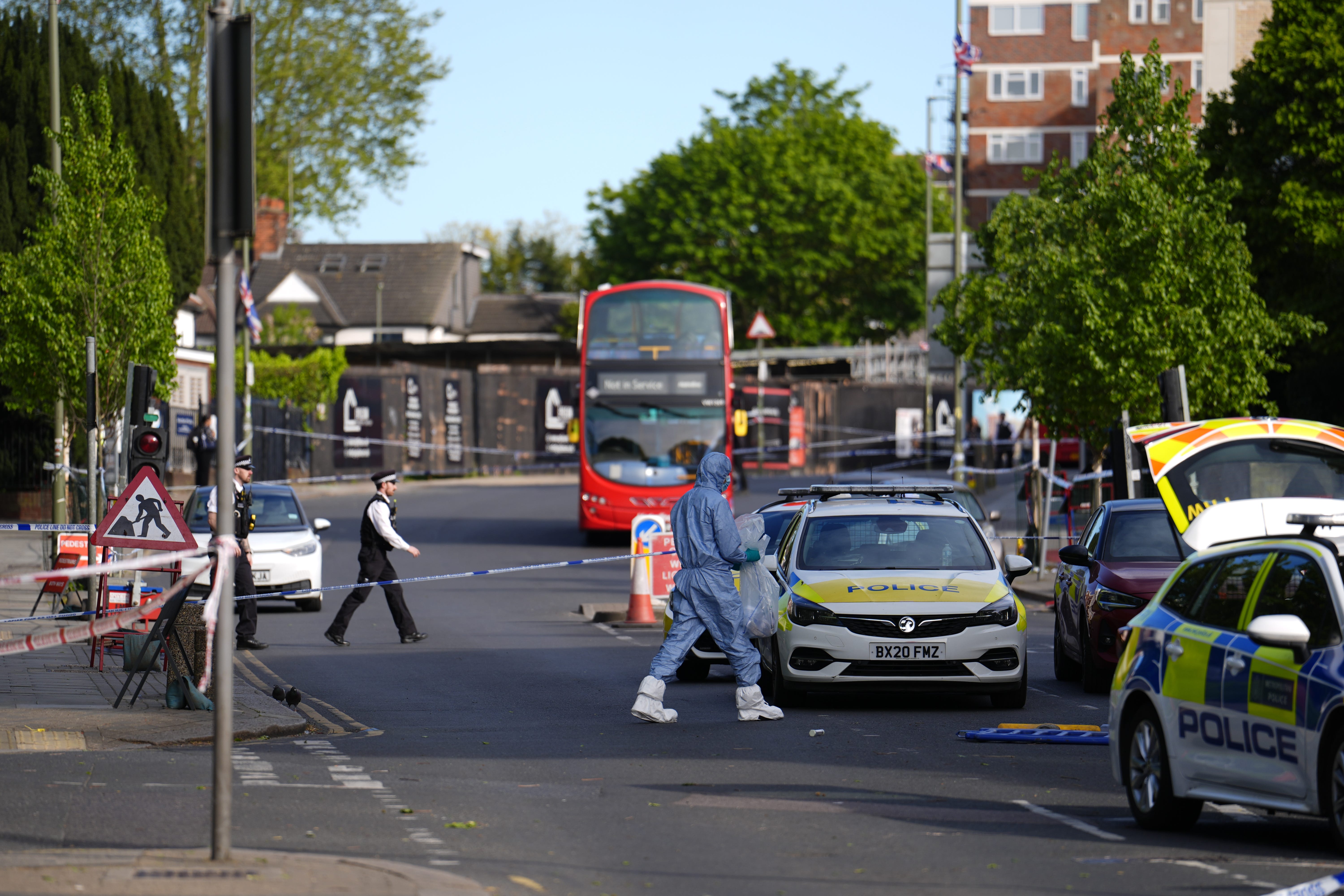 A forensics officer at the scene in Golders Green