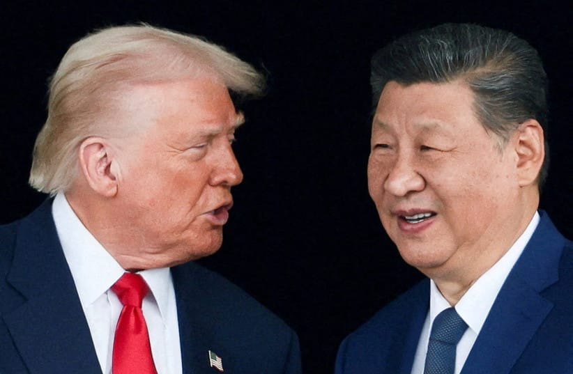 US President Donald Trump and Chinese President Xi Jinping talk as they leave after a bilateral meeting at Gimhae International Airport, on the sidelines of the Asia-Pacific Economic Cooperation (APEC) summit, in Busan, South Korea, October 30, 2025.