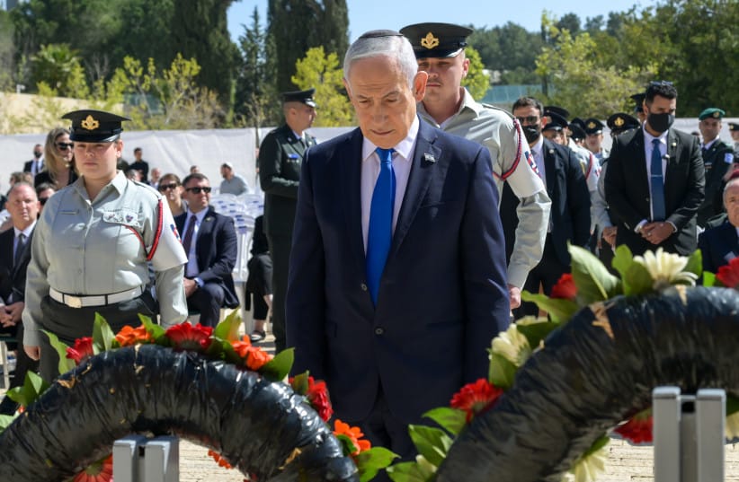 Prime Minister Benjamin Netanyahu lays a wreath during a Holocaust memorial ceremony at Yad Vashem, April 14, 2026