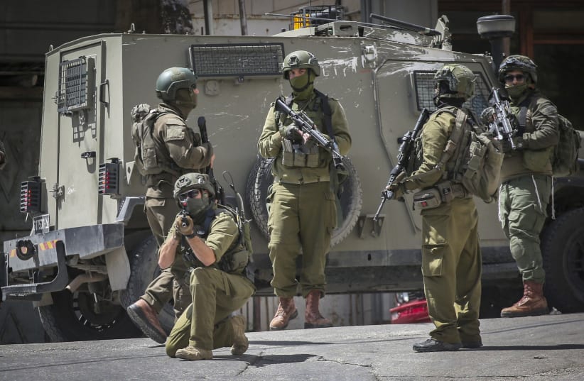 (ILLUSTRATIVE) Israeli security forces operate during a raid in the West Bank city of Nablus, April 27, 2026