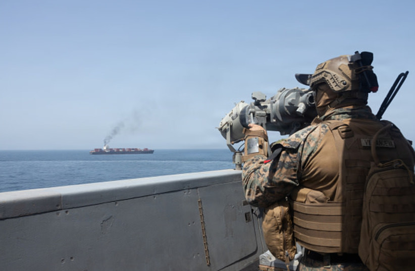 U.S. forces patrol the Arabian Sea near M/V Touska on April 20, 2026, after firing upon the Iranian-flagged vessel that the U.S. accused of attempting to violate the U.S. naval blockade of Iranian ports near the Strait of Hormuz.