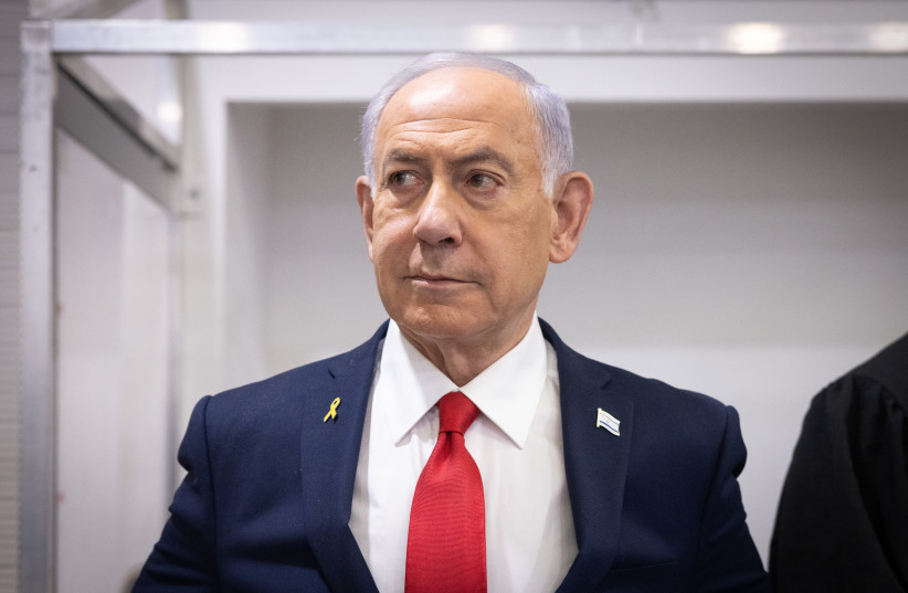 Prime Minister Benjamin Netanyahu arrives to the courtroom at the Distrcit court in Tel Aviv, before the start of his testimony in the trial against him, October 28, 2025.