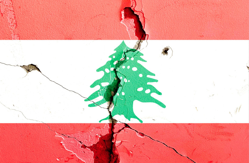 An illustrative image of the Lebanese flag cracking down the middle.