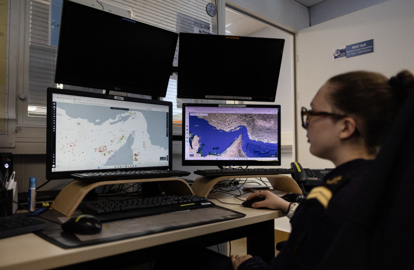 A worker of the Maritime International Cooperation and Awareness (MICA) center looks at screens at the MICA in Brest, western France on April 27, 2026. (credit: Fred TANNEAU / AFP via Getty Images)