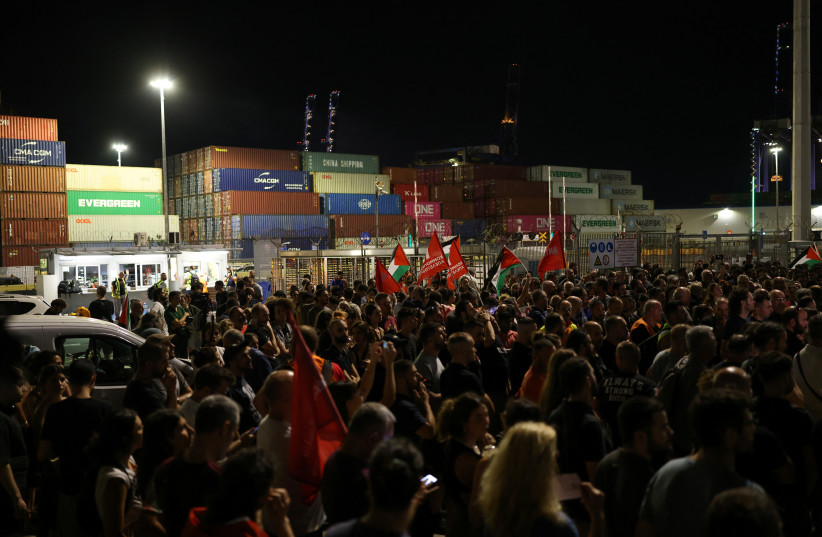 Pro-Palestinian demonstrators gather at Perama port during a protest against a ship carrying weapons for Israel, in Piraeus, Greece.