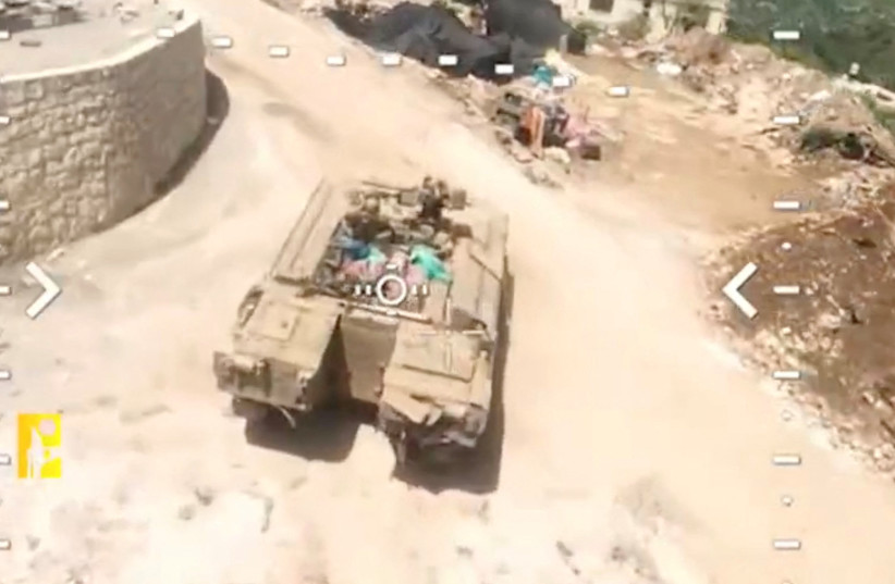 Footage released by Hezbollah claims to show an attack on an armored personnel carrier, carried out in Qantara, Lebanon, in this screengrab taken from a handout video released on April 28, 2026