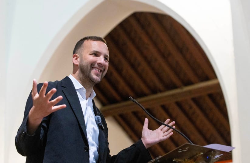 Green Party leader Zack Polanski gives a speech to party supporters at the Church of Saint John the Evangelist on May 2, 2026 in Cardiff, Wales.